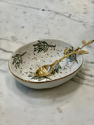 Seasonal oval bowl with evergreens and gold flecks